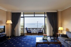 Executive Suite, Sea View | Living room | 60-cm LED TV with cable channels, TV