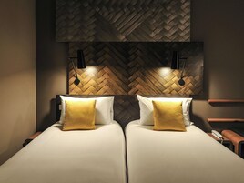 Premium bedding, individually furnished, desk, laptop workspace