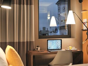 Premium bedding, individually furnished, desk, laptop workspace