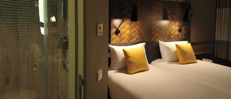 Shower, eco-friendly toiletries, hair dryer, towels
