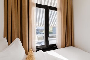 Ropa de cama de alta calidad y camas con pillow-top 