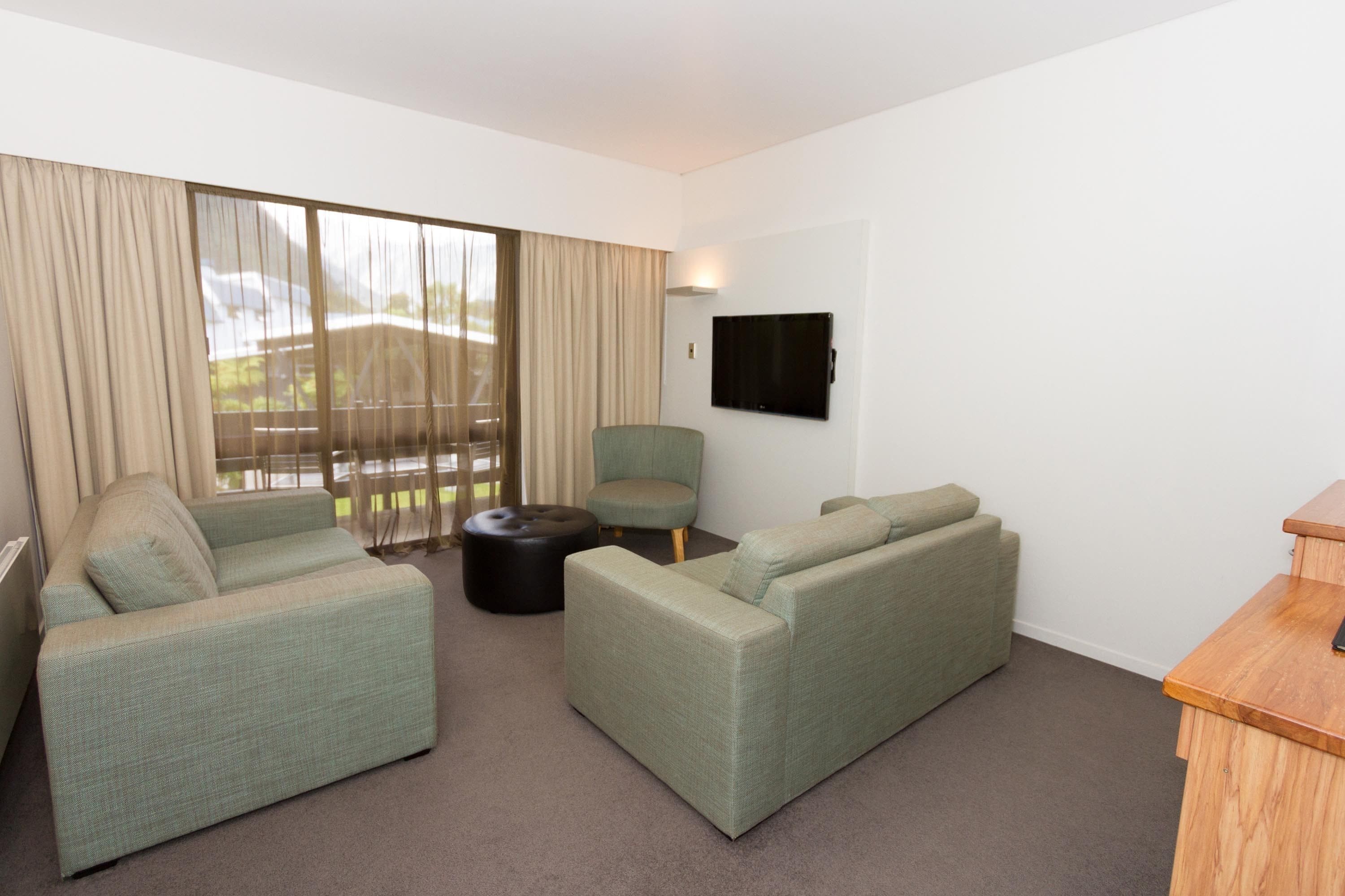 superior suite | living area | tv