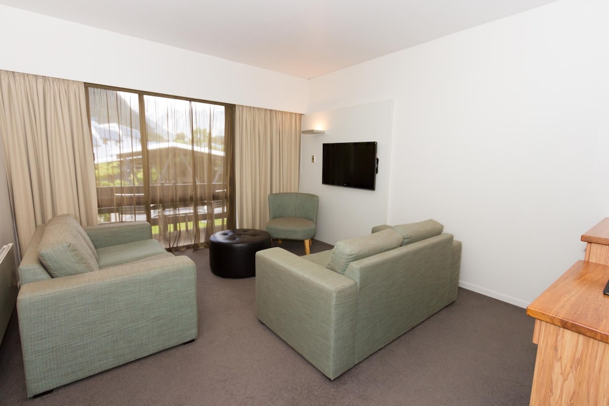 superior suite | living area | tv