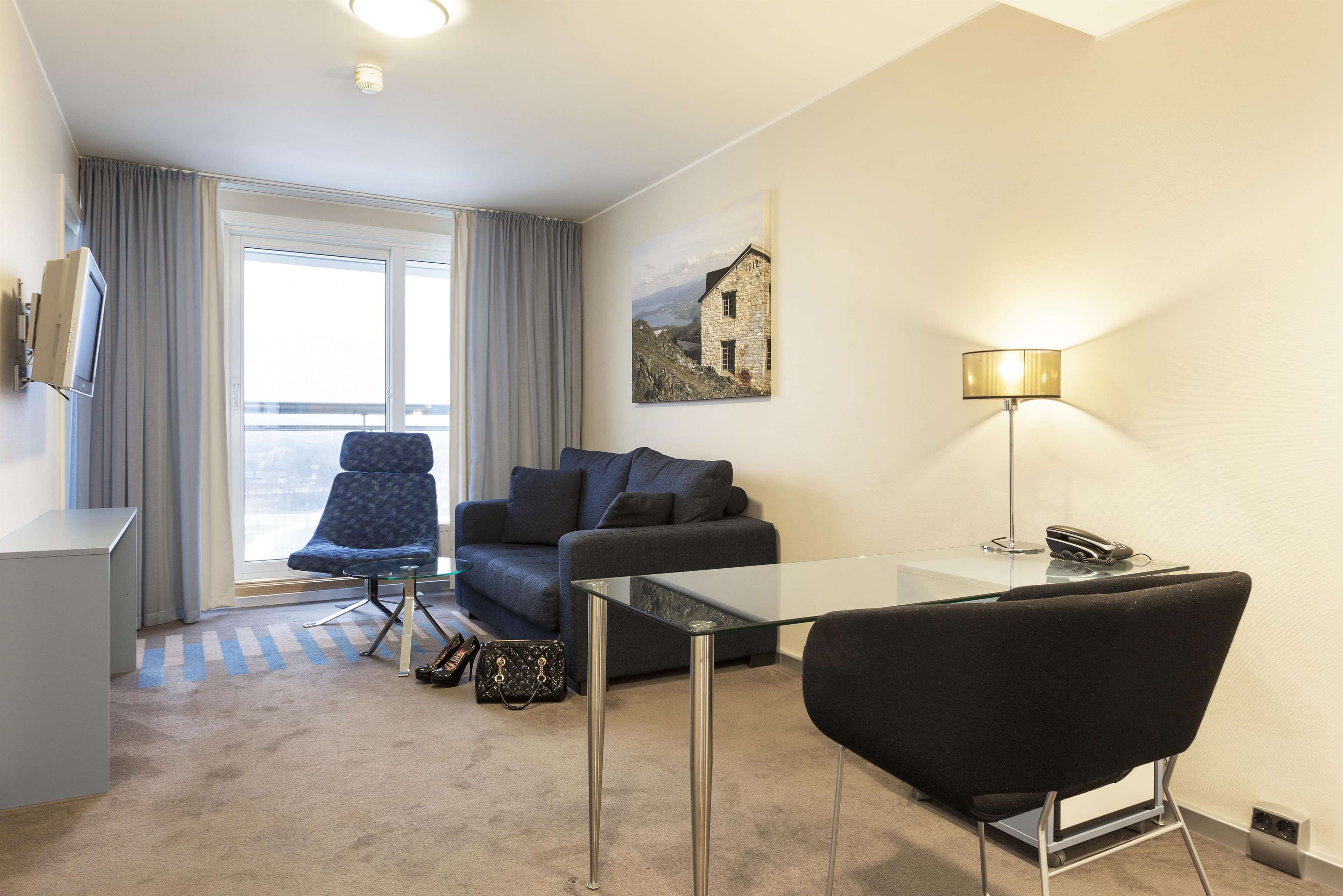 junior suite | 1 bedroom, in-room safe, desk, rollaway beds