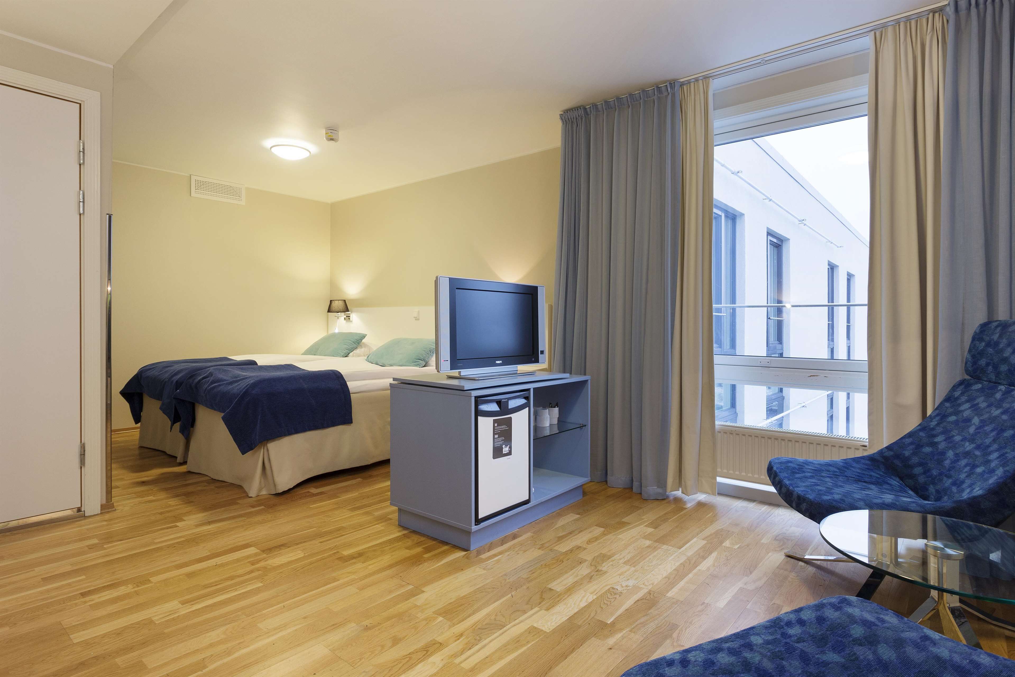 junior suite | 1 bedroom, in-room safe, desk, rollaway beds