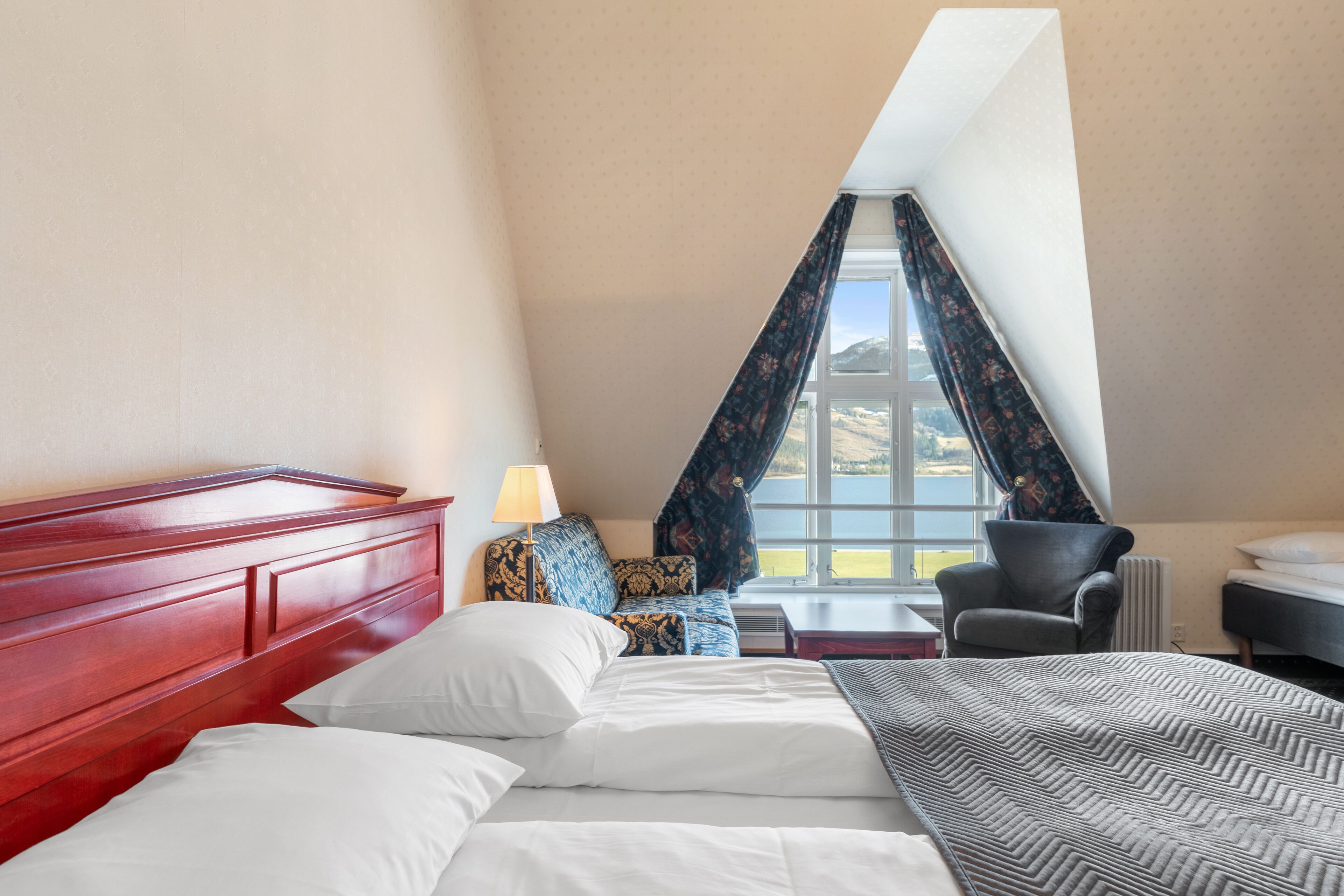 Pillow-top beds, desk, blackout curtains, iron/ironing board