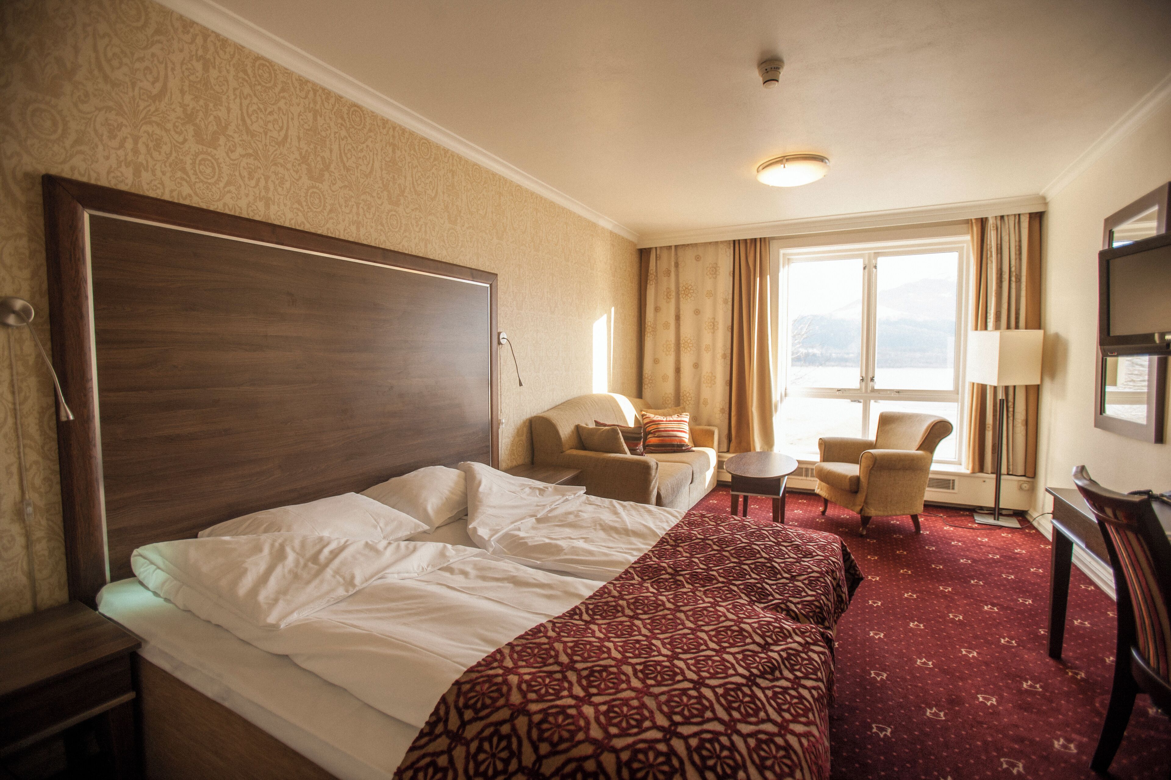 Small Family Double or Twin Room, Partial Lake View | Pillow-top beds, desk, blackout curtains, iron/ironing board