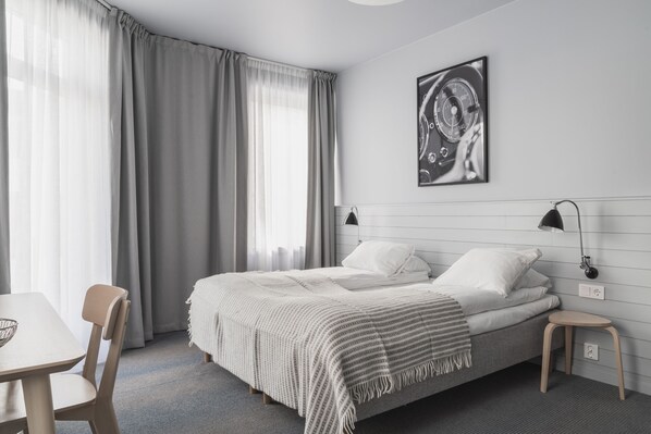 Pillow-top beds, desk, laptop workspace, soundproofing