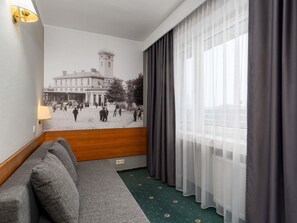 Minibar, desk, blackout curtains, rollaway beds