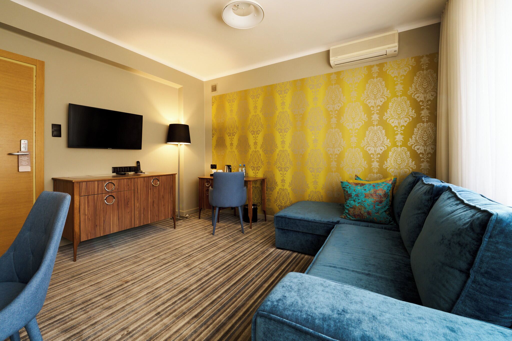 Family Room | Hypo-allergenic bedding, desk, laptop workspace, blackout drapes