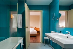 Triple Room | Bathroom | Deep soaking tub, hair dryer, bidet, towels