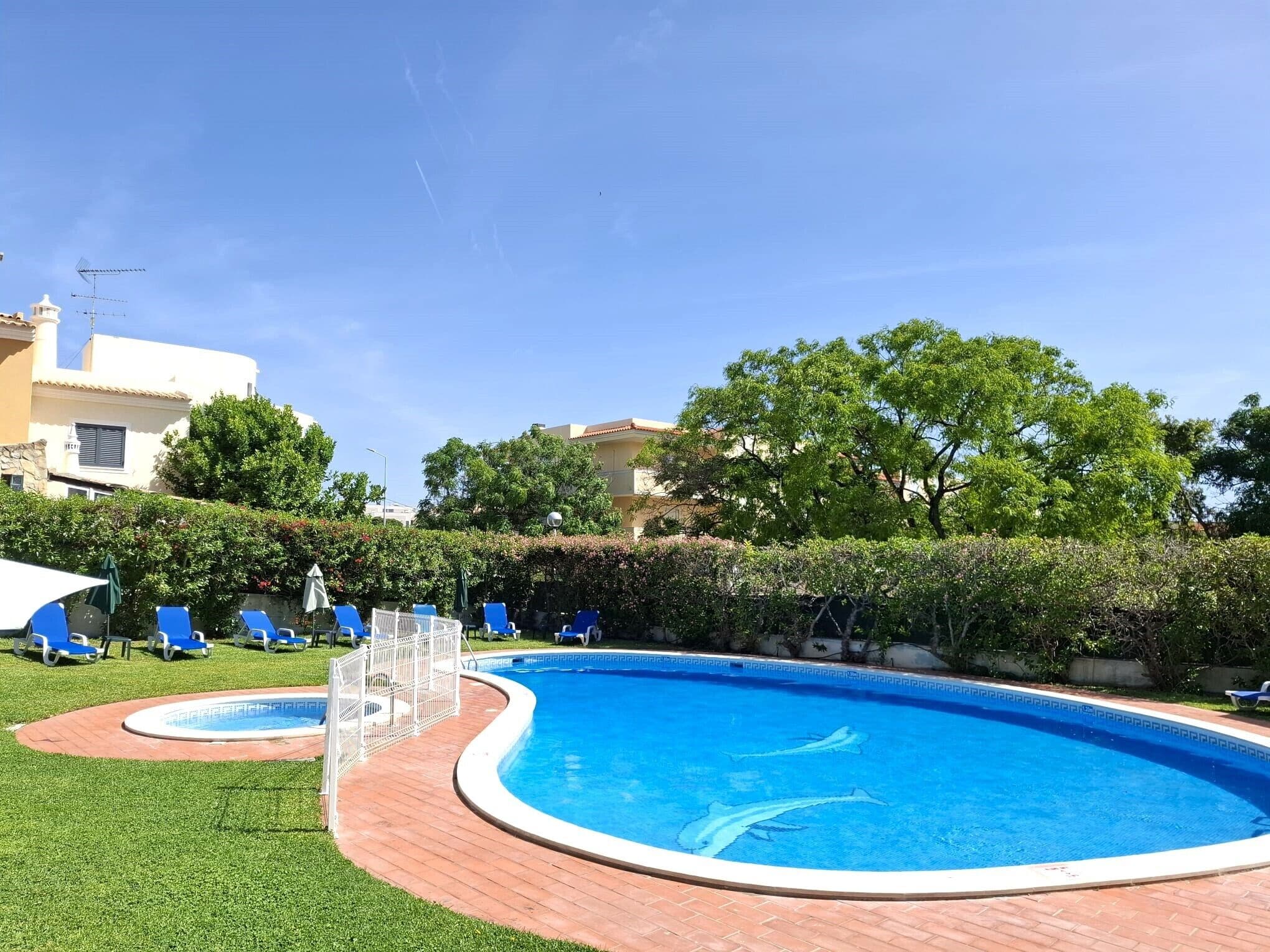 Seasonal outdoor pool, pool loungers