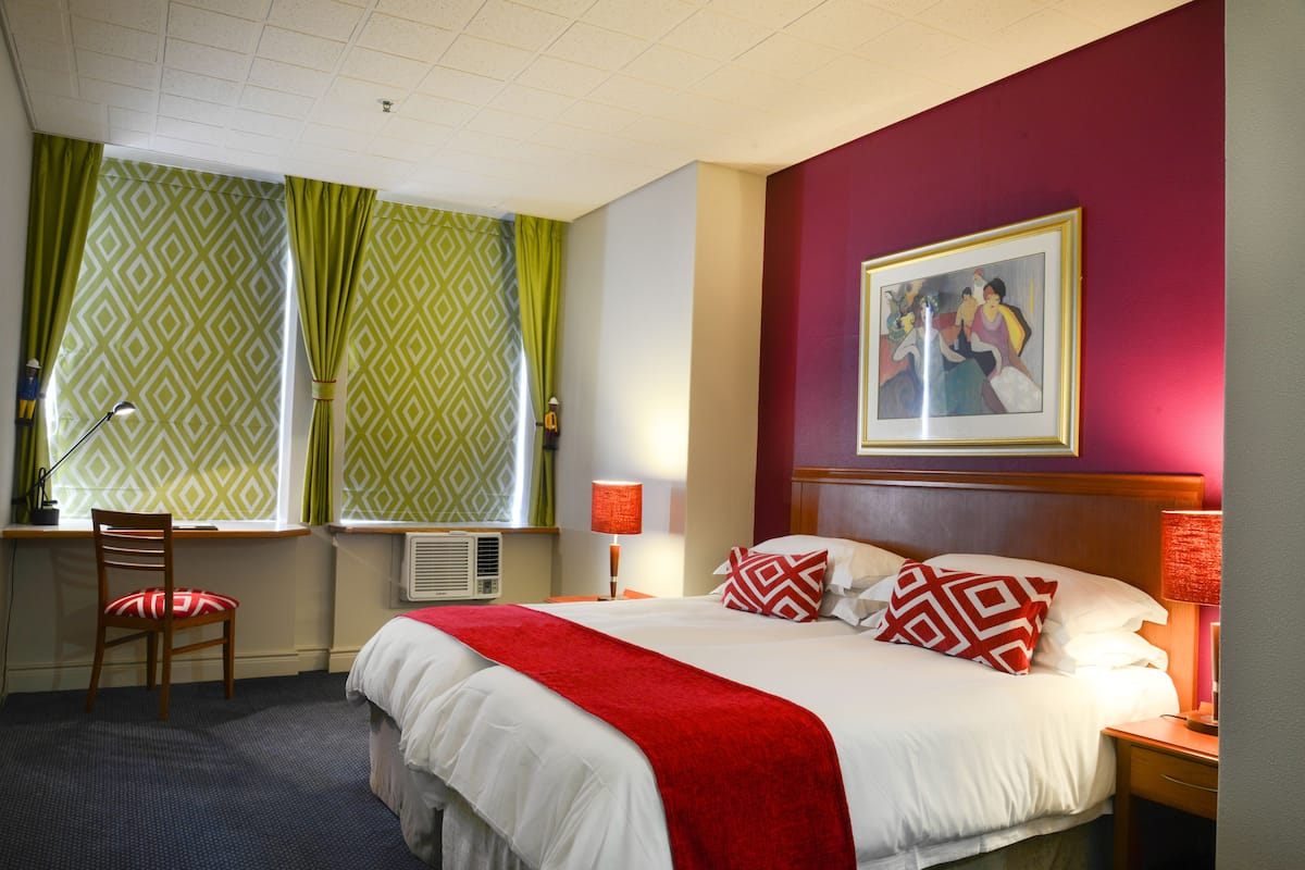 Superior Double or Twin Room | Minibar, in-room safe, desk, blackout curtains