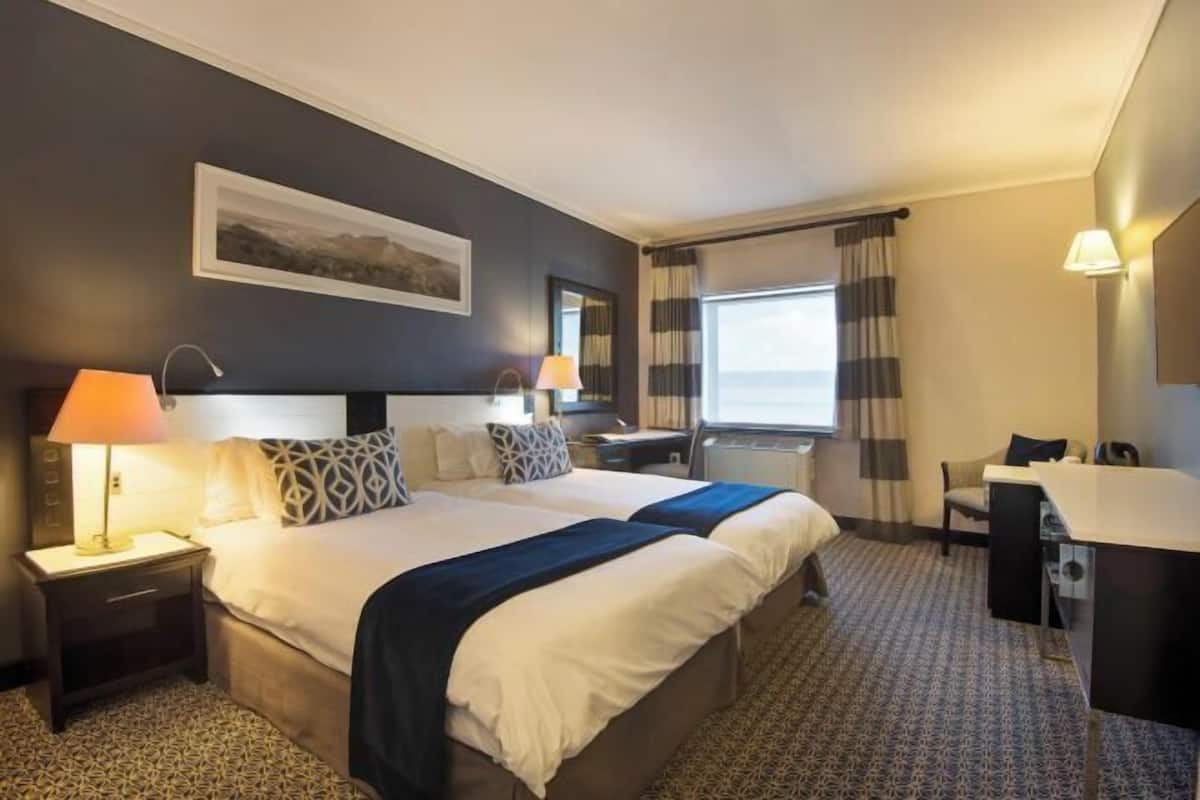 Ropa de cama de alta calidad y minibar