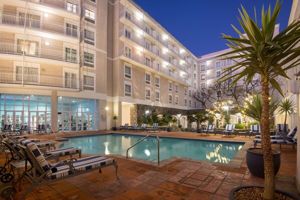 Outdoor pool, pool umbrellas, sun loungers