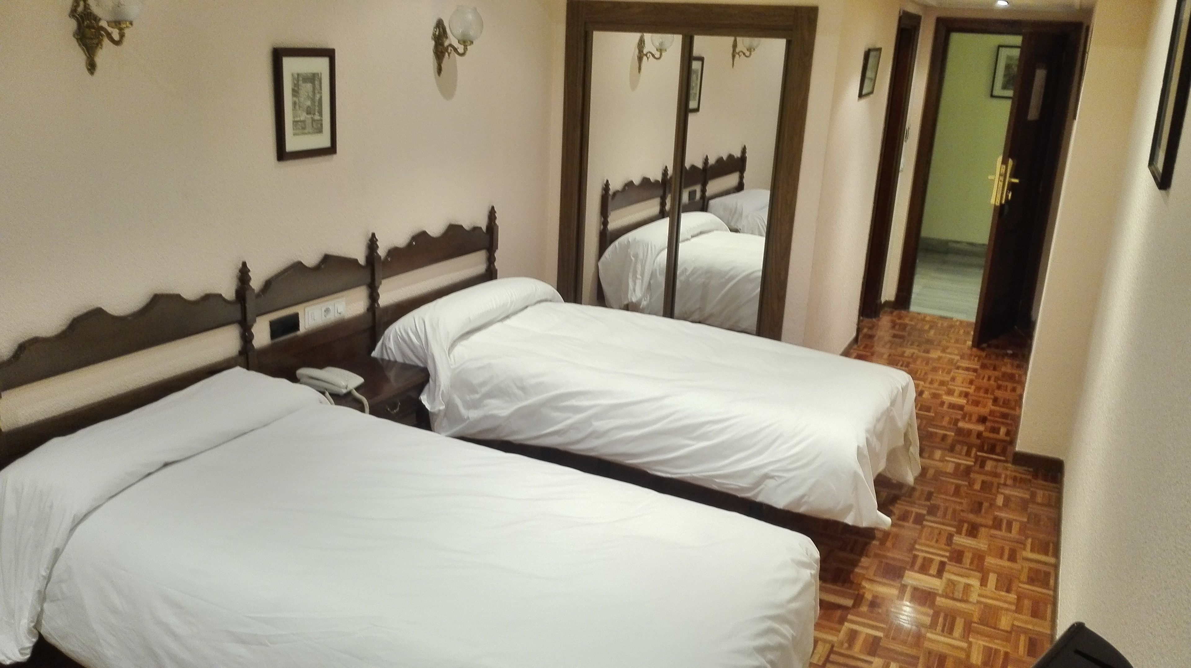 standard twin room | in-room safe, desk, rollaway beds