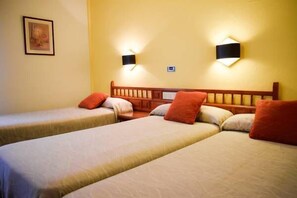 Triple Room | 1 bedroom, in-room safe, desk, blackout drapes