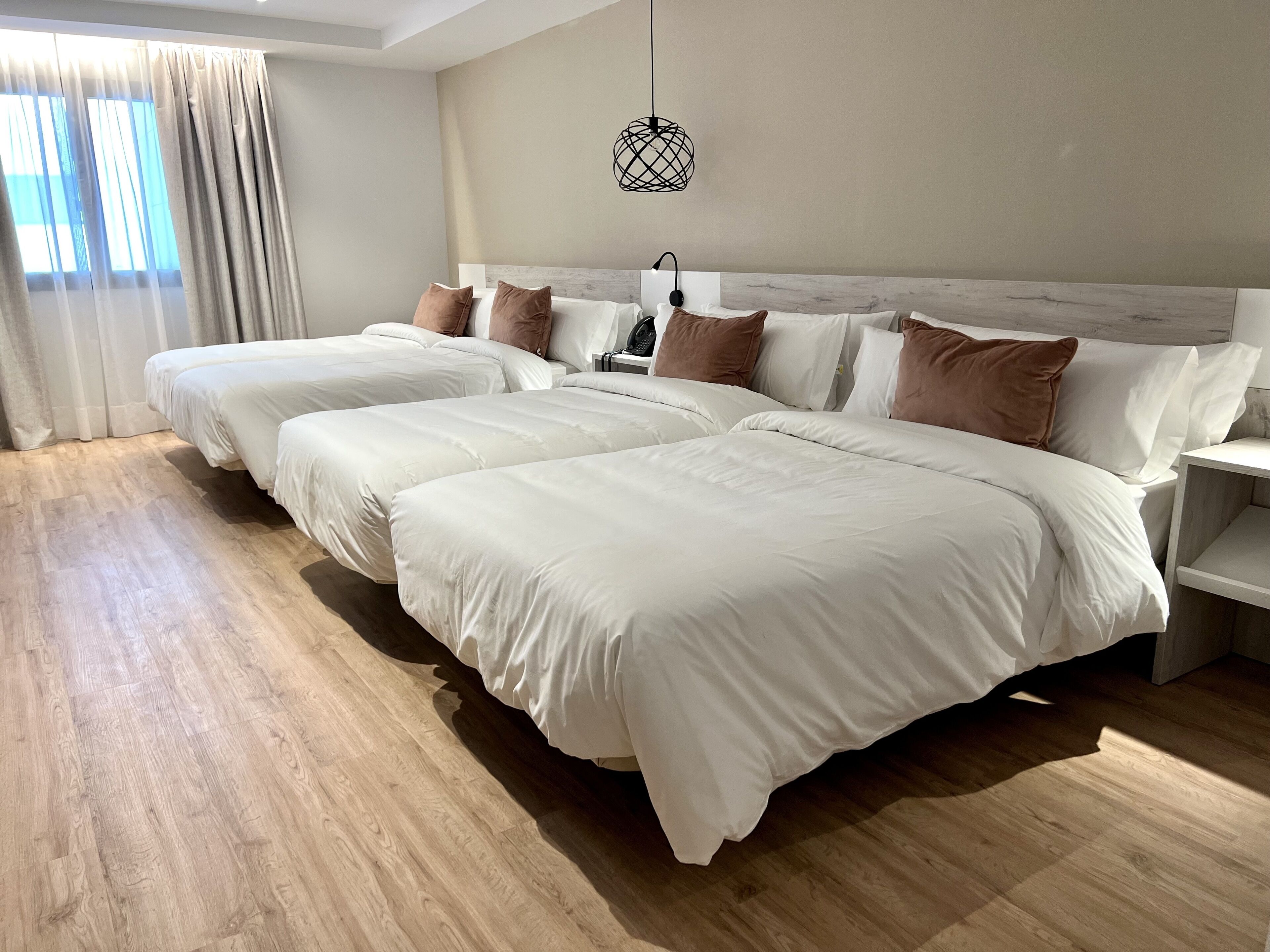 family room | 1 bedroom, premium bedding, minibar, in-room safe