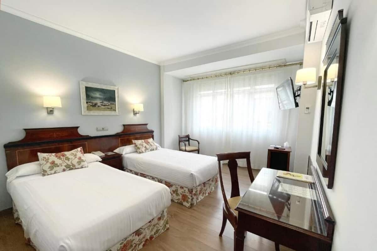 Ropa de cama de alta calidad y minibar
