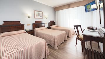Triple Room | Premium bedding, minibar, in-room safe, desk