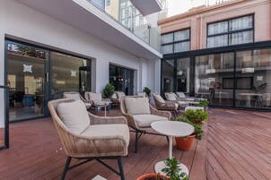 Seasonal outdoor pool, open 10:00 AM to 9:00 PM, sun loungers