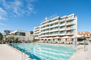 Outdoor pool, pool umbrellas, pool loungers