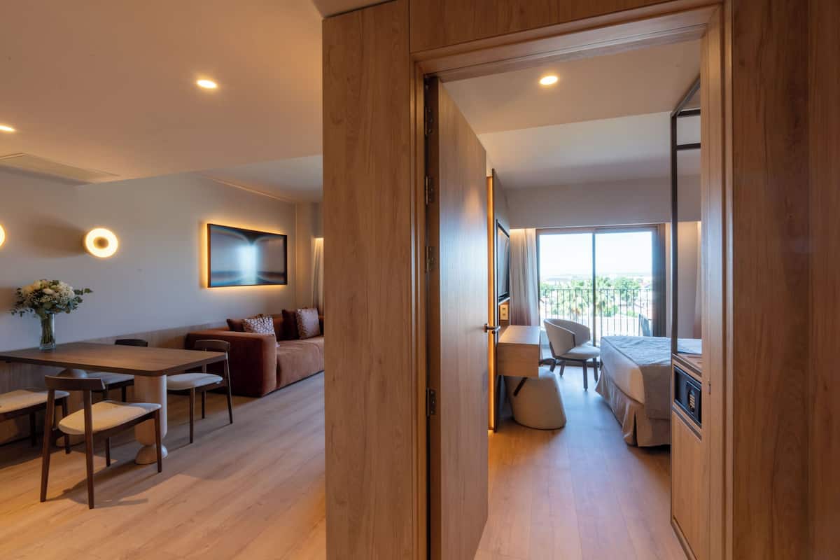 Junior Suite with Balcony - 1 Bed | In-room safe, desk, laptop workspace, blackout drapes