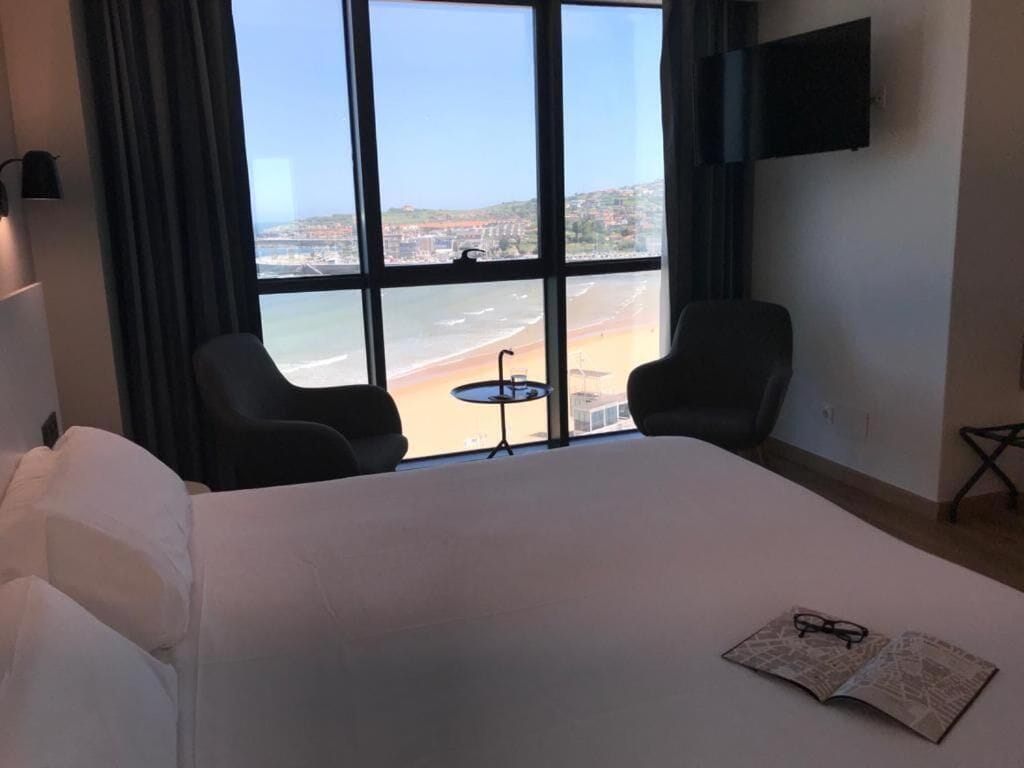 family room, 1 king bed, beach view | view from room