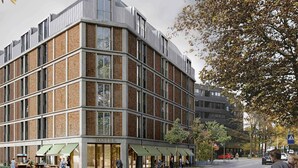 A hotel with a modern brick facade, large windows, and a ground-level restaurant. - ibis Styles Bern City (Bern)