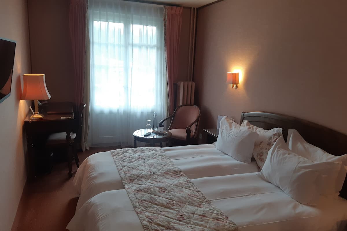 Premium bedding, down comforters, desk, laptop workspace
