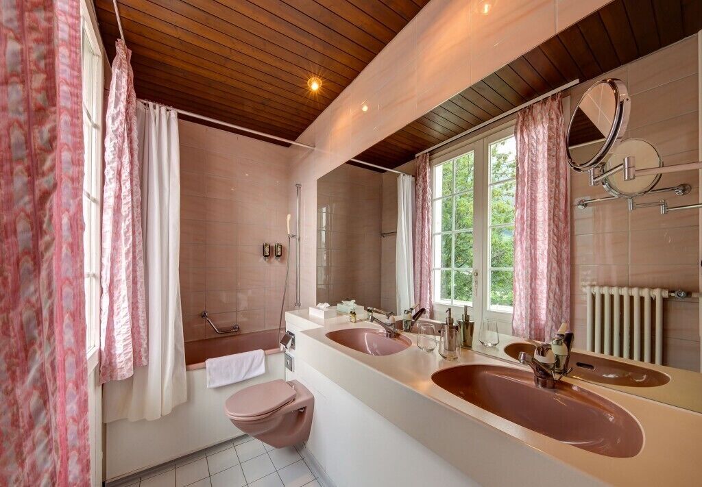 deluxe double room | bathroom | rainfall showerhead, hair dryer, towels