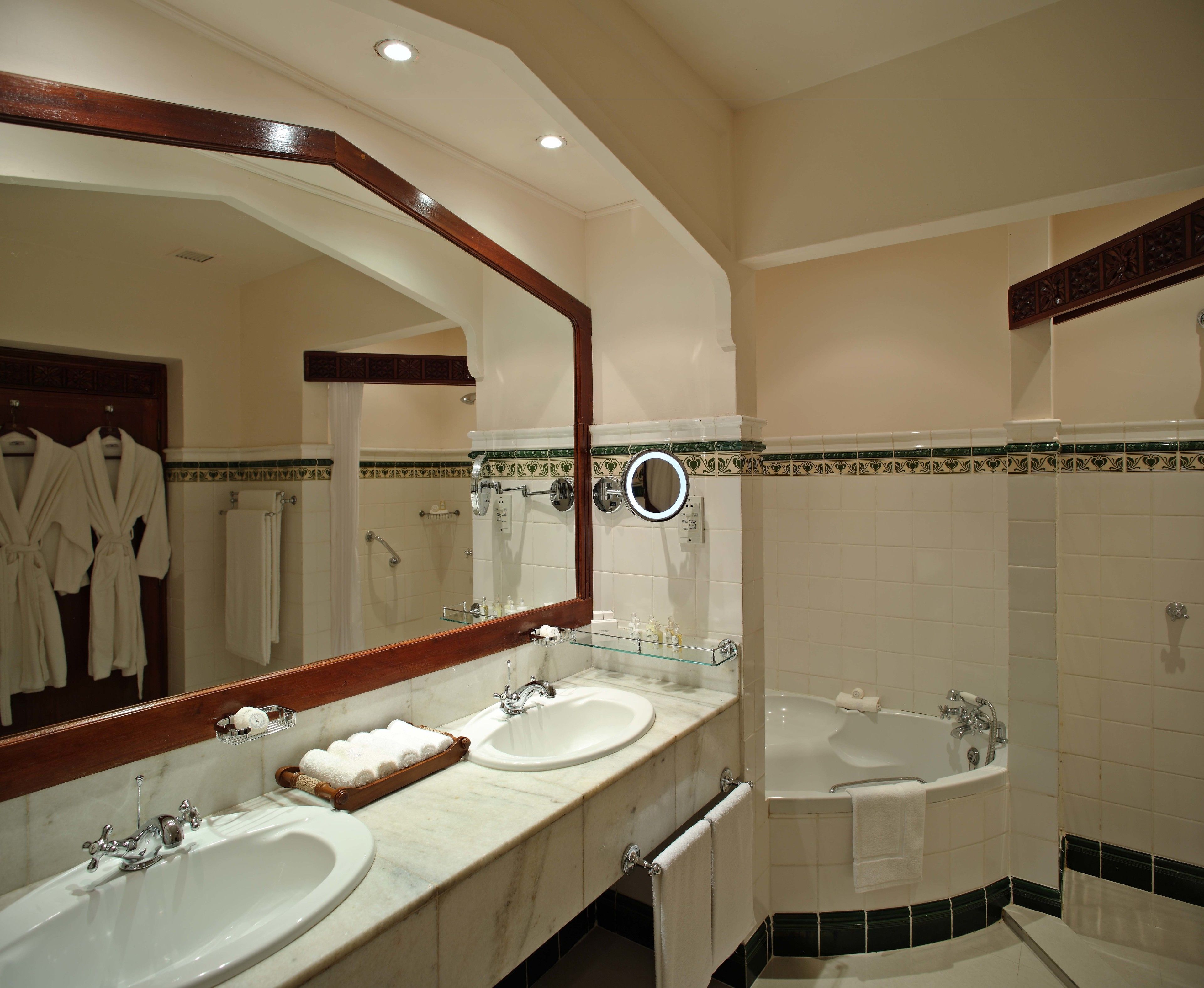 separate bathtub and shower, designer toiletries, hair dryer, bathrobes