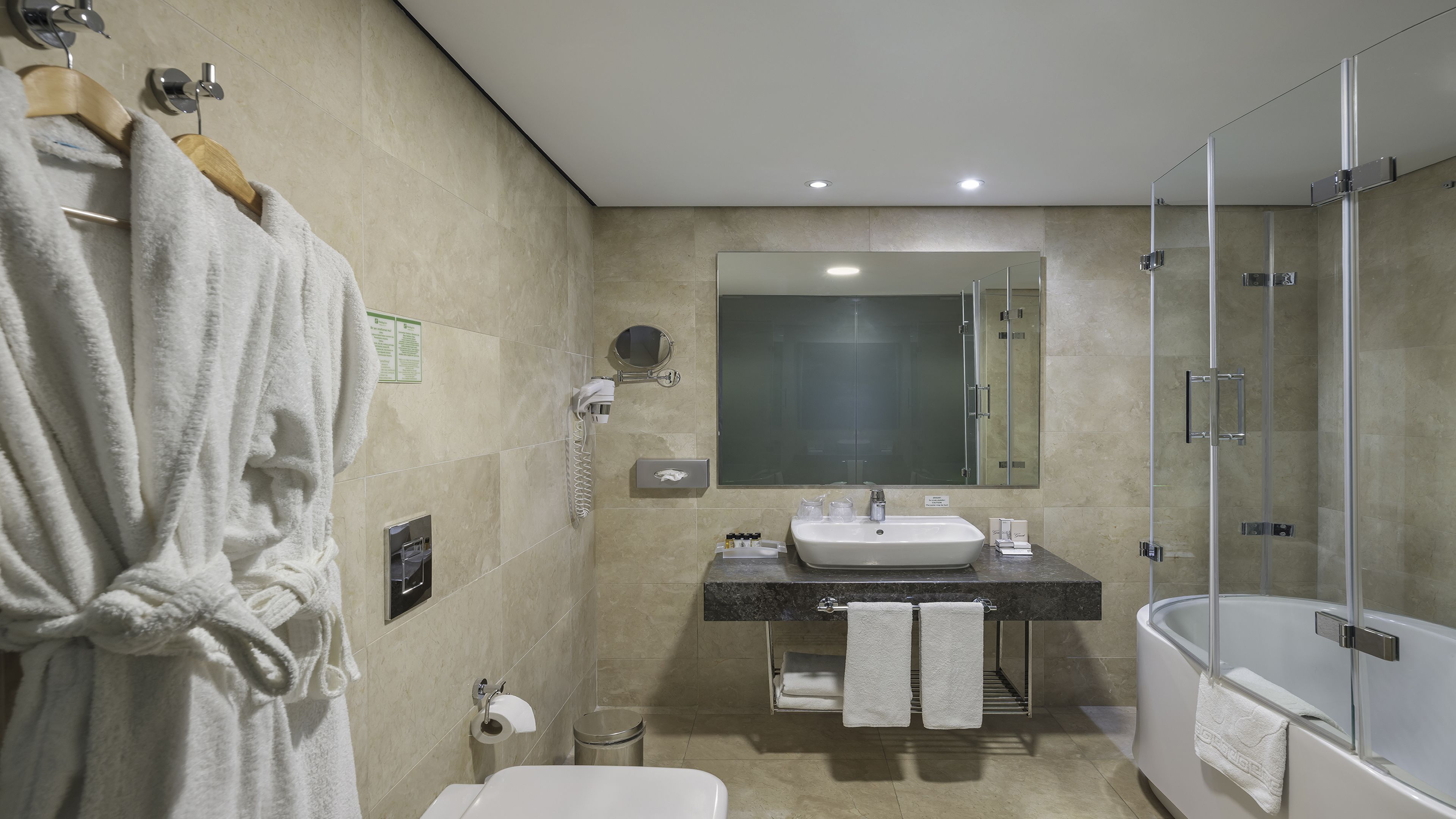 Shower, rainfall showerhead, eco-friendly toiletries, hair dryer