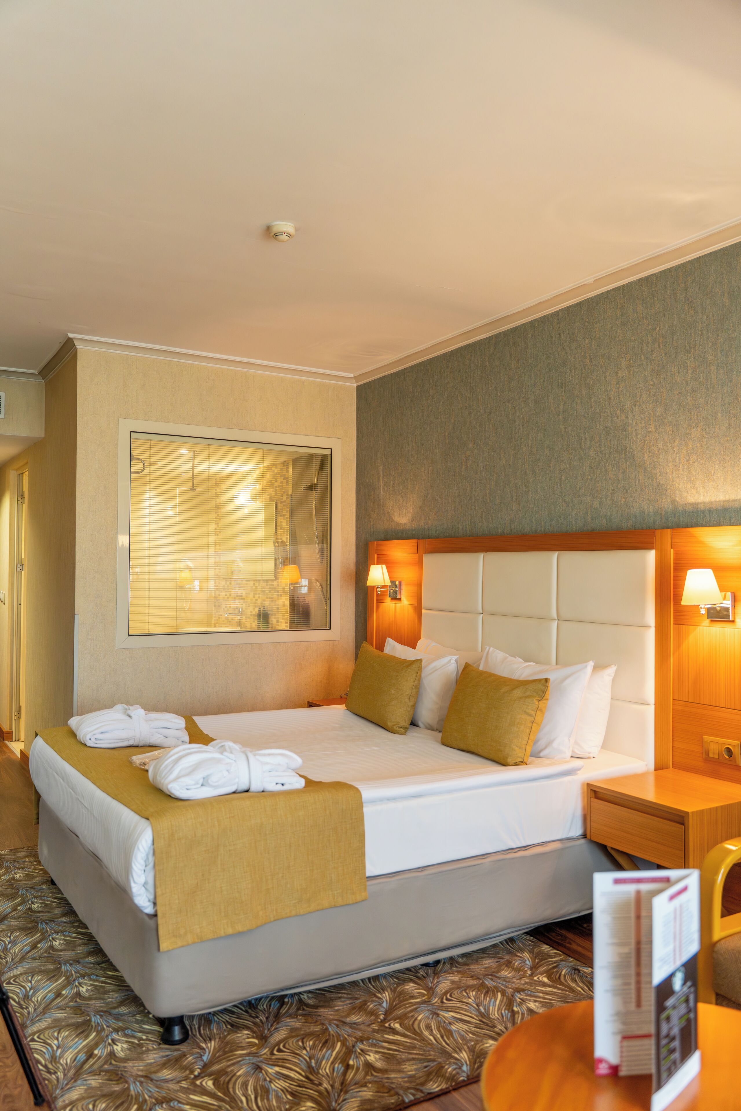 Premium bedding, pillow-top beds, minibar, in-room safe