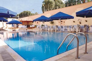 Seasonal outdoor pool, open 10:30 AM to 6:00 PM, sun loungers