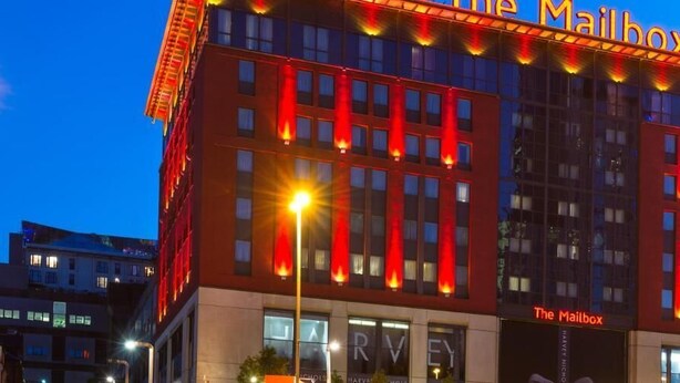 A hotel with a prominent 'The Mailbox' sign, multiple floors, and a modern architectural design. - Comfort Inn Birmingham (Birmingham)
