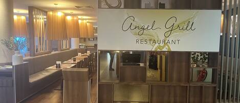 Interior de restaurante con mostrador de madera, zona de asientos y un letrero que dice 'Angel Grill Restaurant'.
