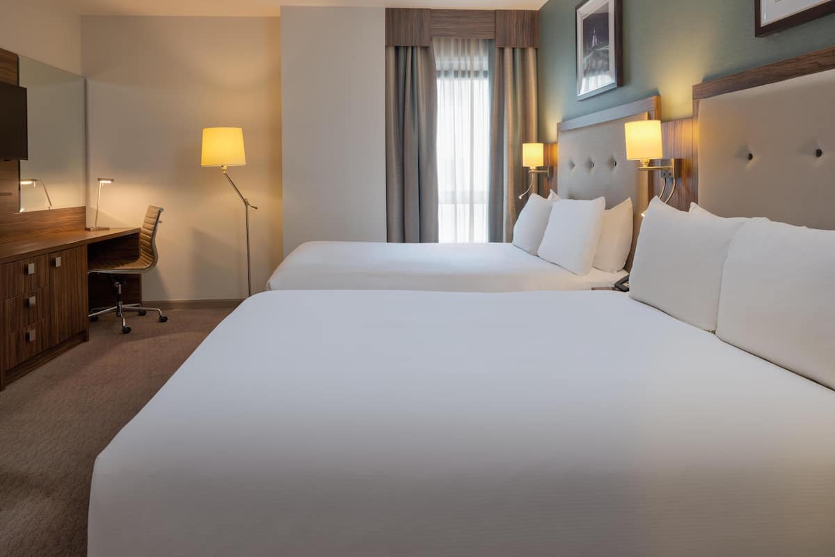 Deluxe Room, 2 Queen Beds | Hypo-allergenic bedding, in-room safe, desk, laptop workspace
