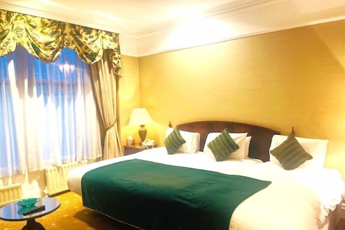 Triple Room | Premium bedding, individually furnished, blackout drapes, soundproofing