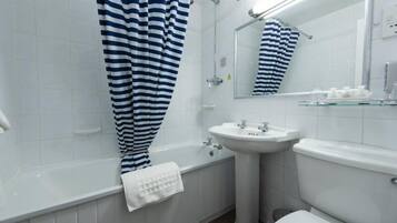 Combined shower/bathtub, hair dryer, towels, shampoo