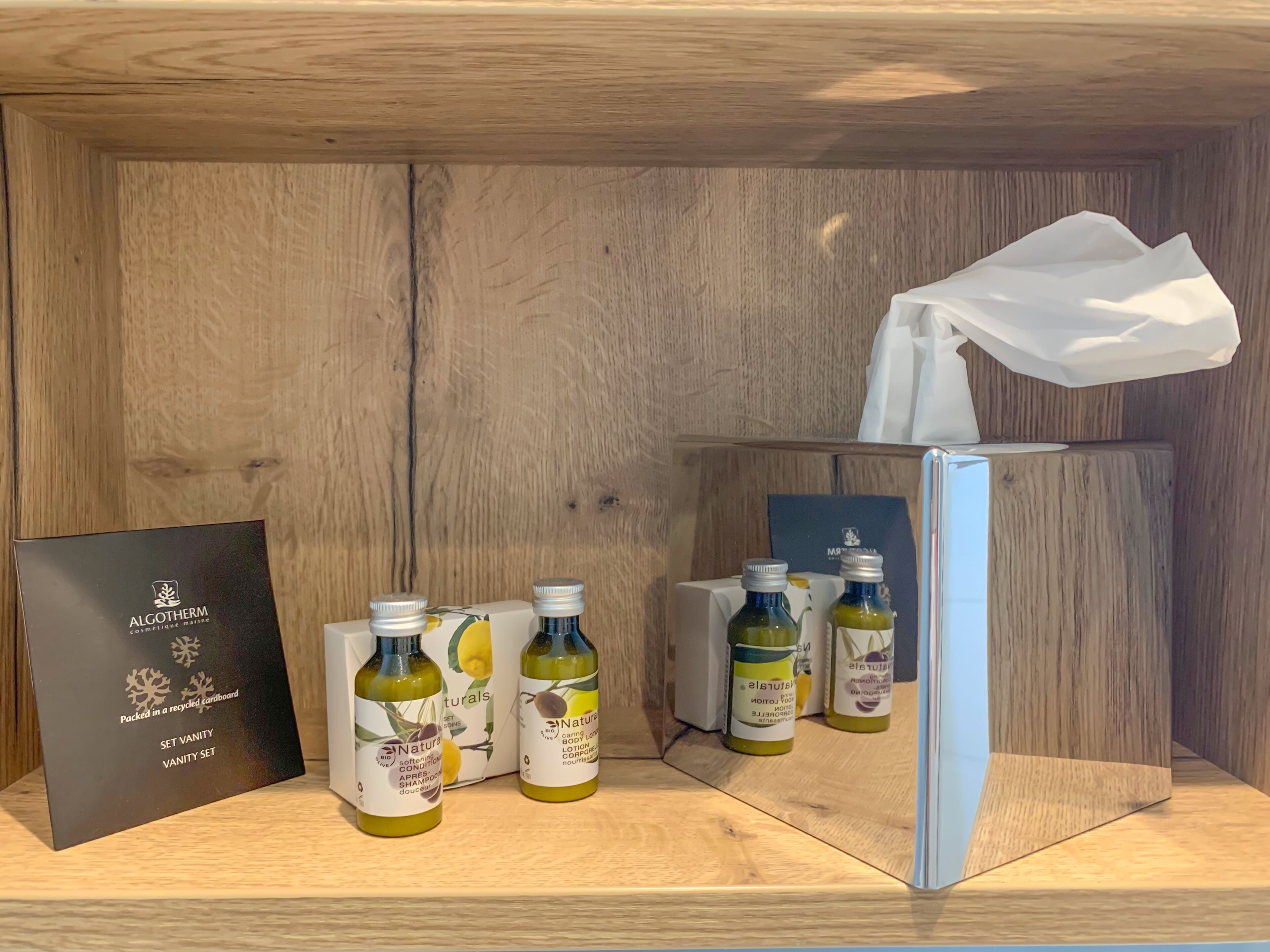 eco-friendly toiletries, hair dryer, towels, soap