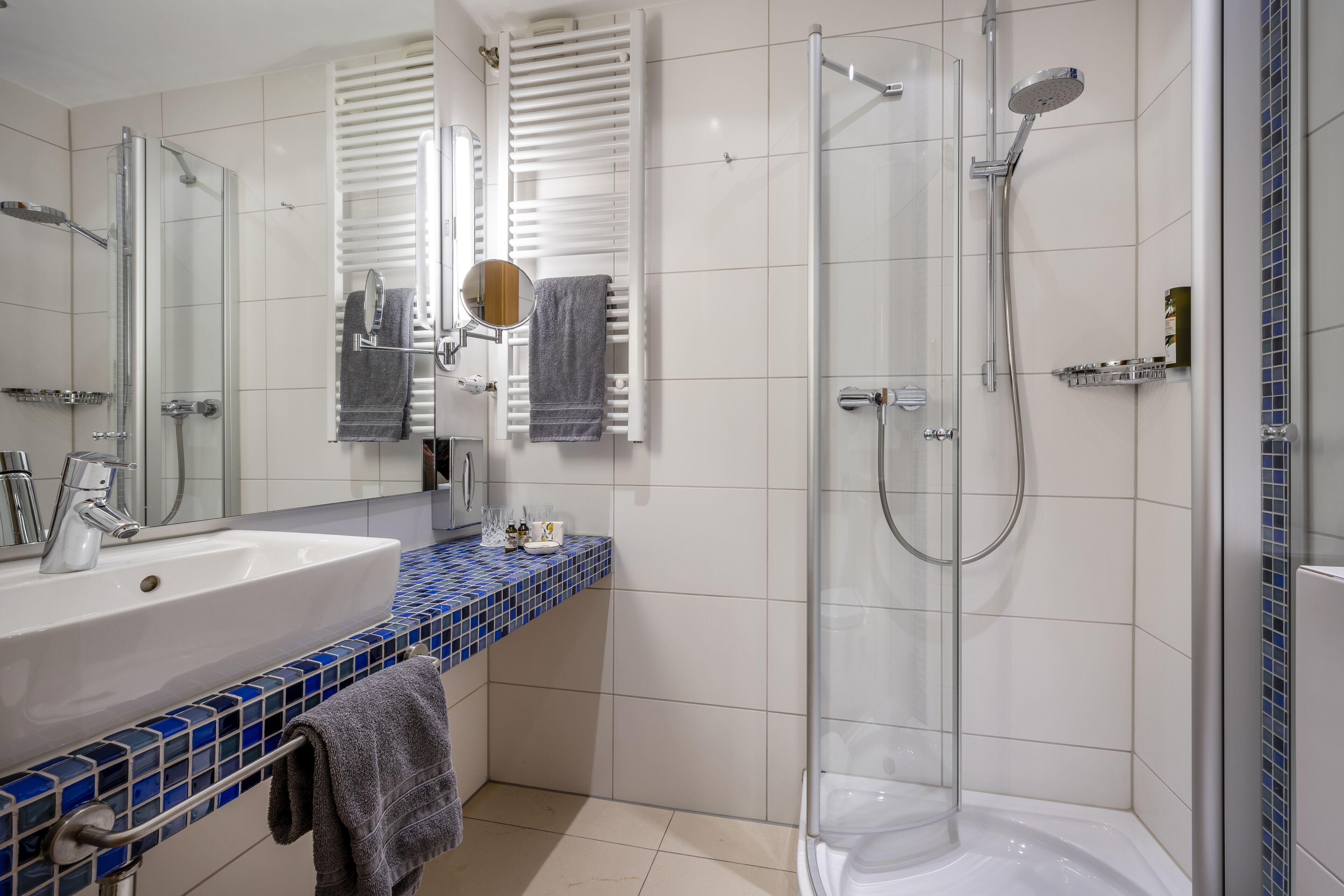 eco-friendly toiletries, hair dryer, towels, soap