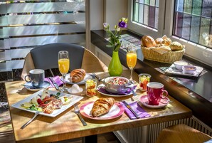 Daily buffet breakfast (EUR 15 per person)