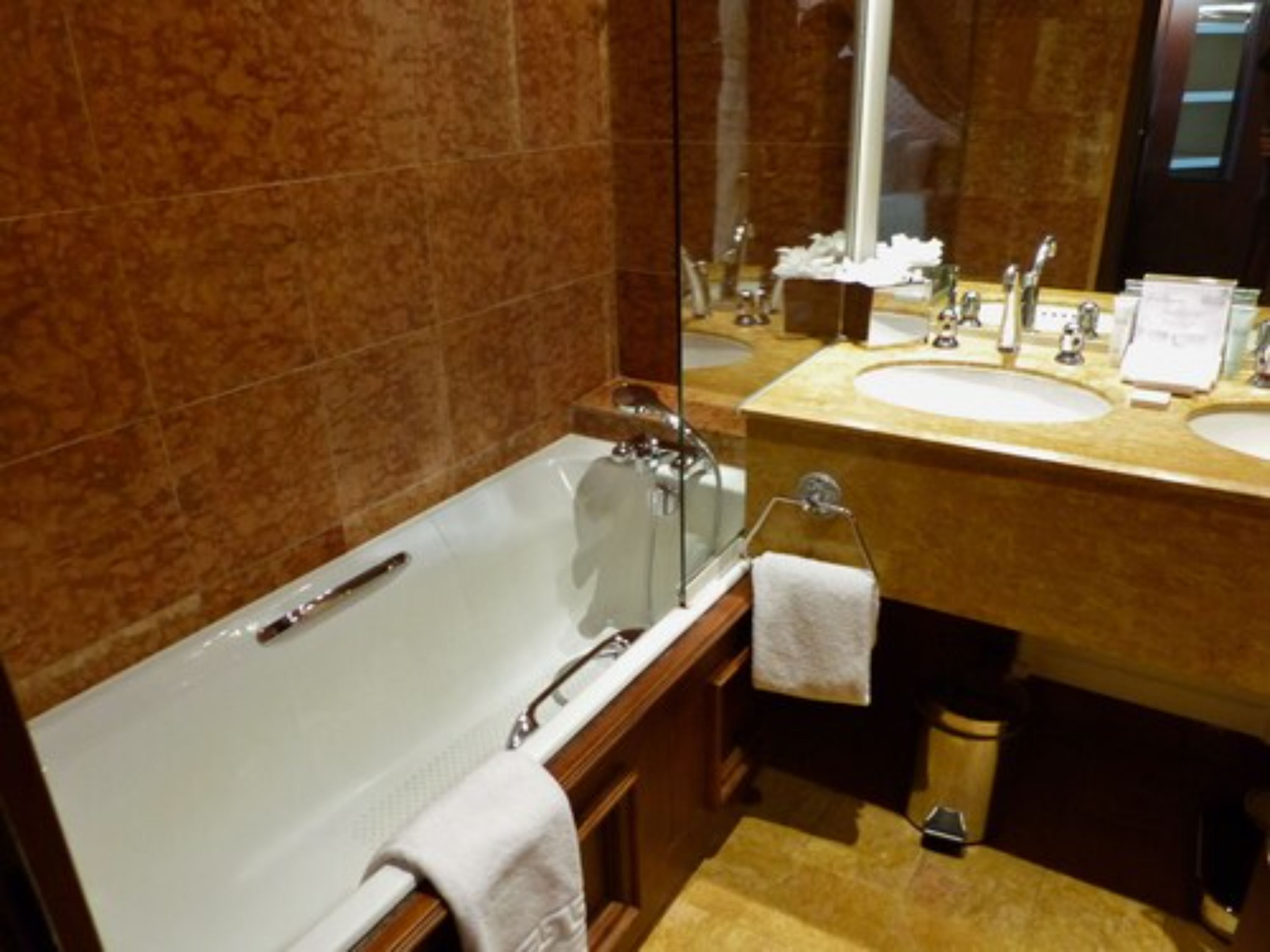 suite | bathroom | deep-soaking bathtub, designer toiletries, hair dryer, bathrobes