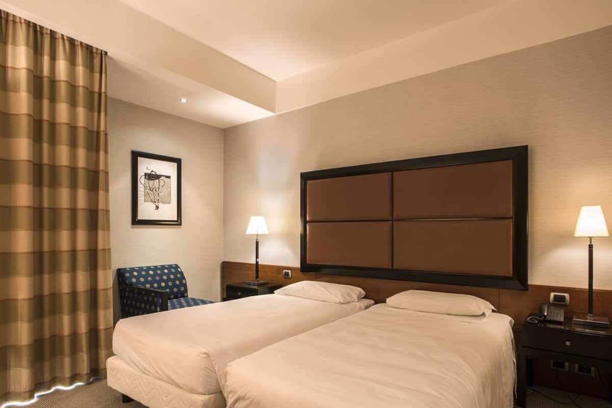 Down duvets, pillow-top beds, minibar, in-room safe