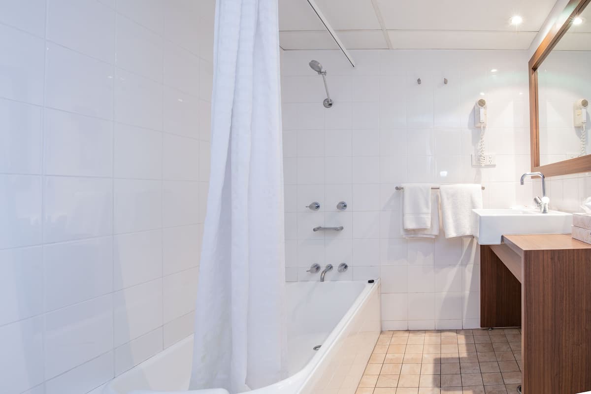 Shower, eco-friendly toiletries, hair dryer, towels