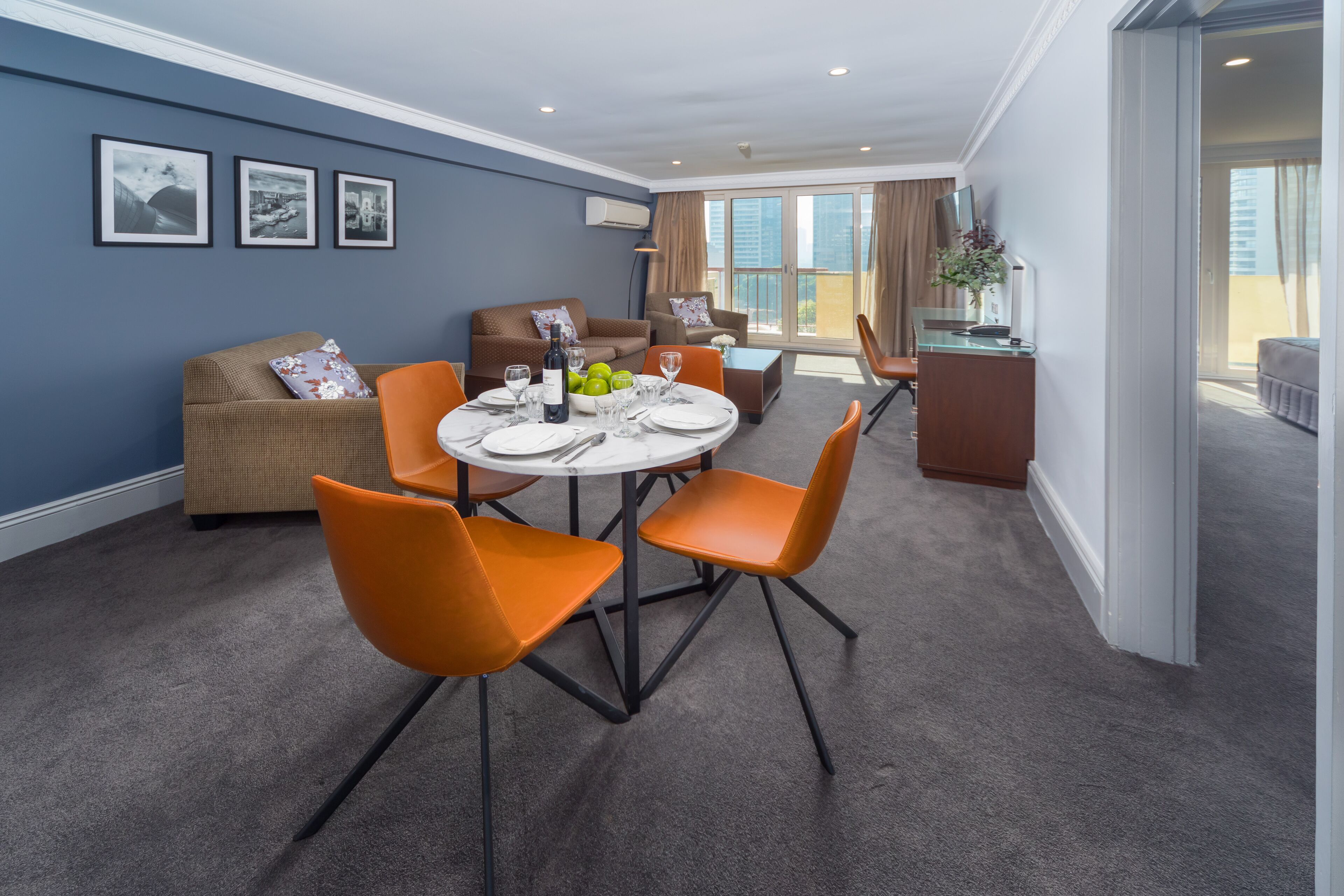 two bedroom front apartment + light breakfast placed in room | living area | 40-inch lcd tv with cable channels, tv, dvd player