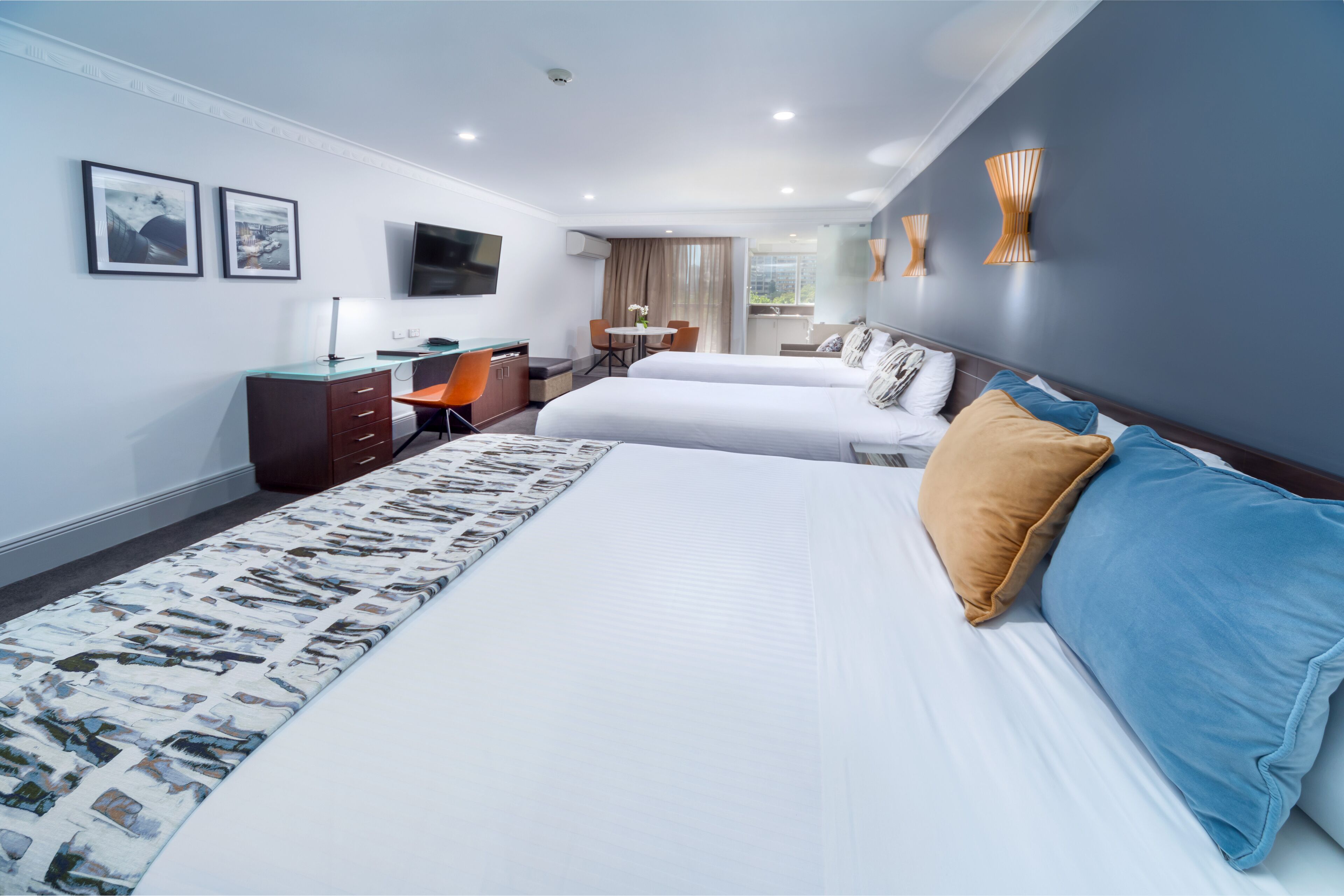 deluxe family room - 4 people + light breakfast placed in room | in-room safe, desk, soundproofing, iron/ironing board