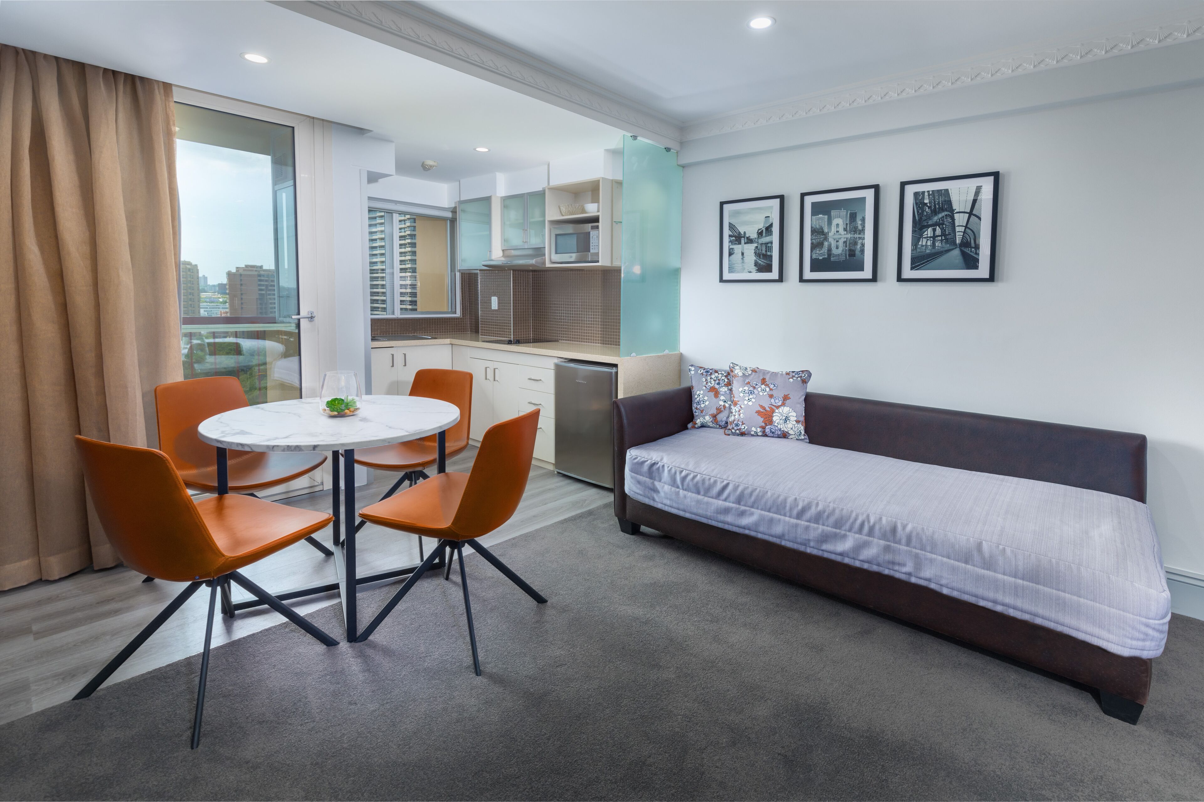 deluxe family room - 5 people + light breakfast placed in room | living area | 40-inch lcd tv with cable channels, tv, dvd player