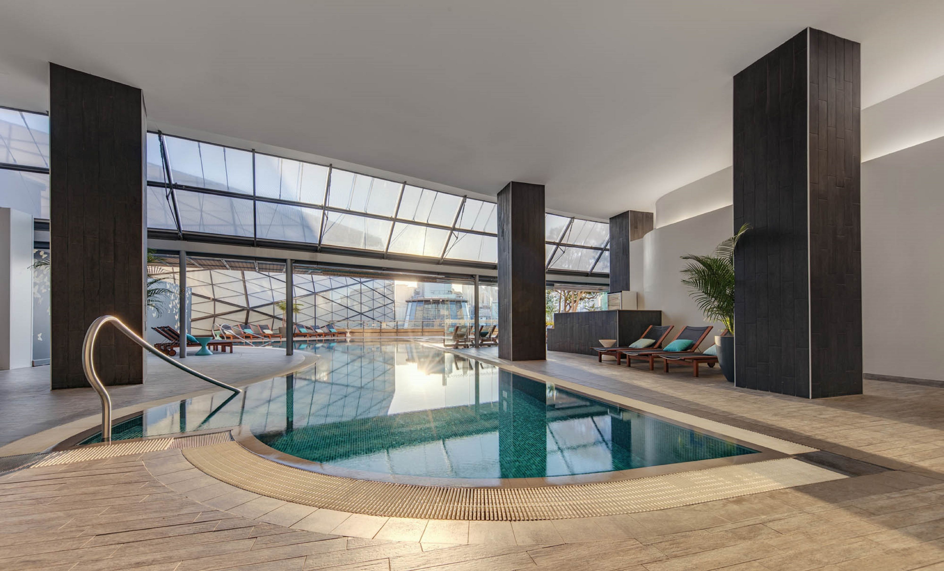 outdoor pool, pool umbrellas, pool loungers